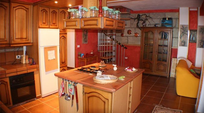 Cocinas con isla Cocina en l con isla abierta al recibidor