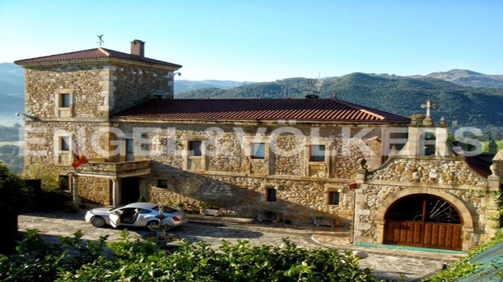 Casa con torre