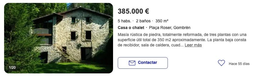 masía rústica de piedra con jardín