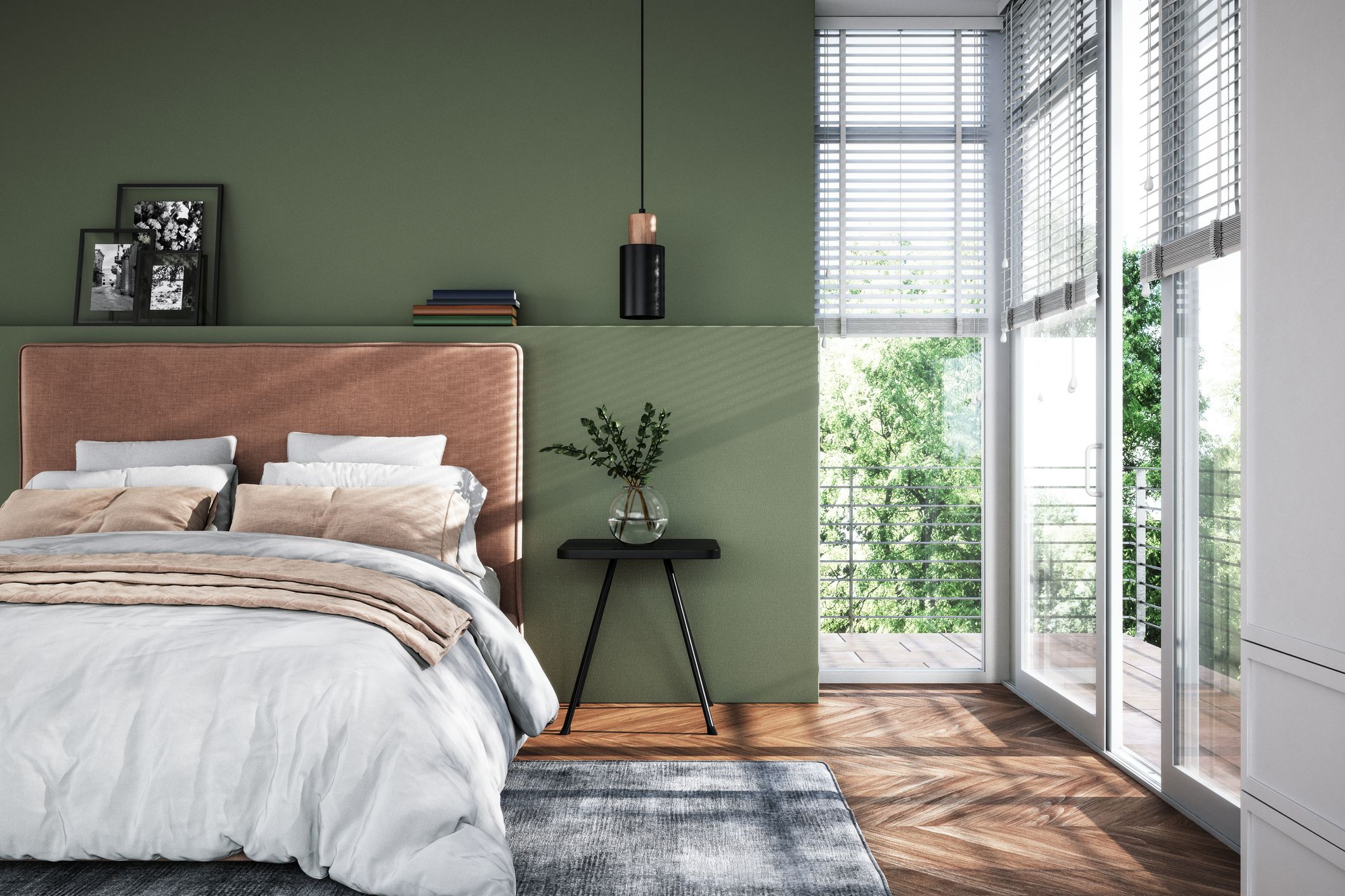 Dormitorio de matrimonio moderno en verde oliva con cabecero tapizado y textiles en tonos tierra cálidos