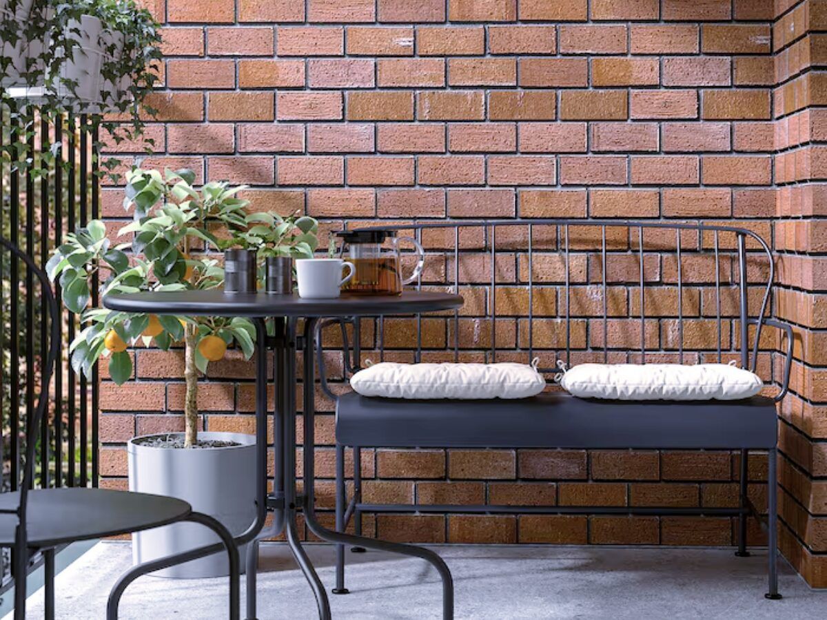 Decorar balcón mediano sofá