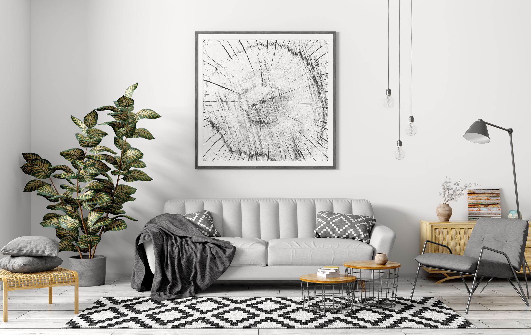 Salón moderno con sofá gris y cuadro grande sobre el sofá, idea elegante sobre cómo decorar las paredes del salón