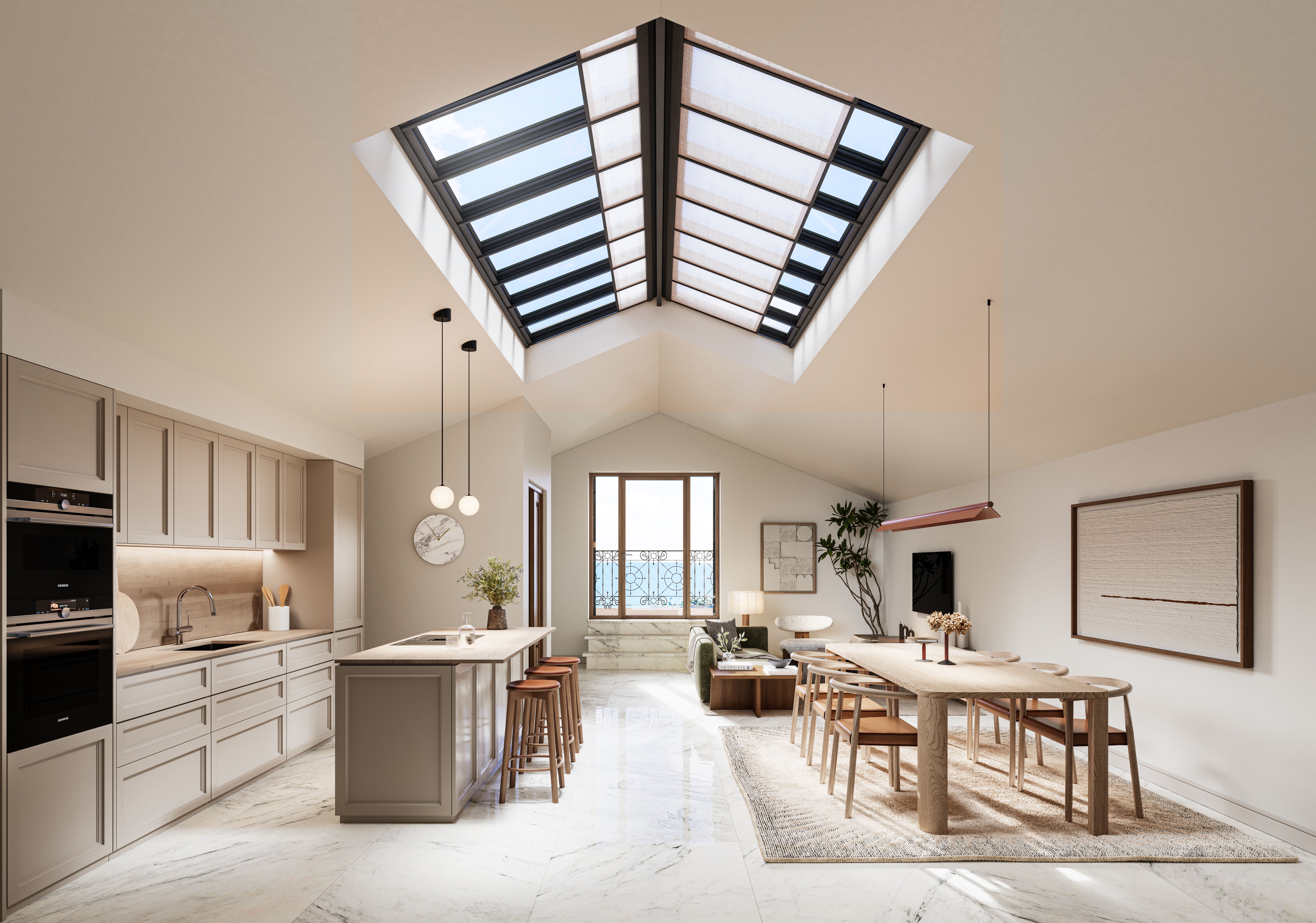 Cocina abierta integrada en salón-comedor con gran lucernario, techos altos y acabados elegantes en un ático de lujo en Málaga