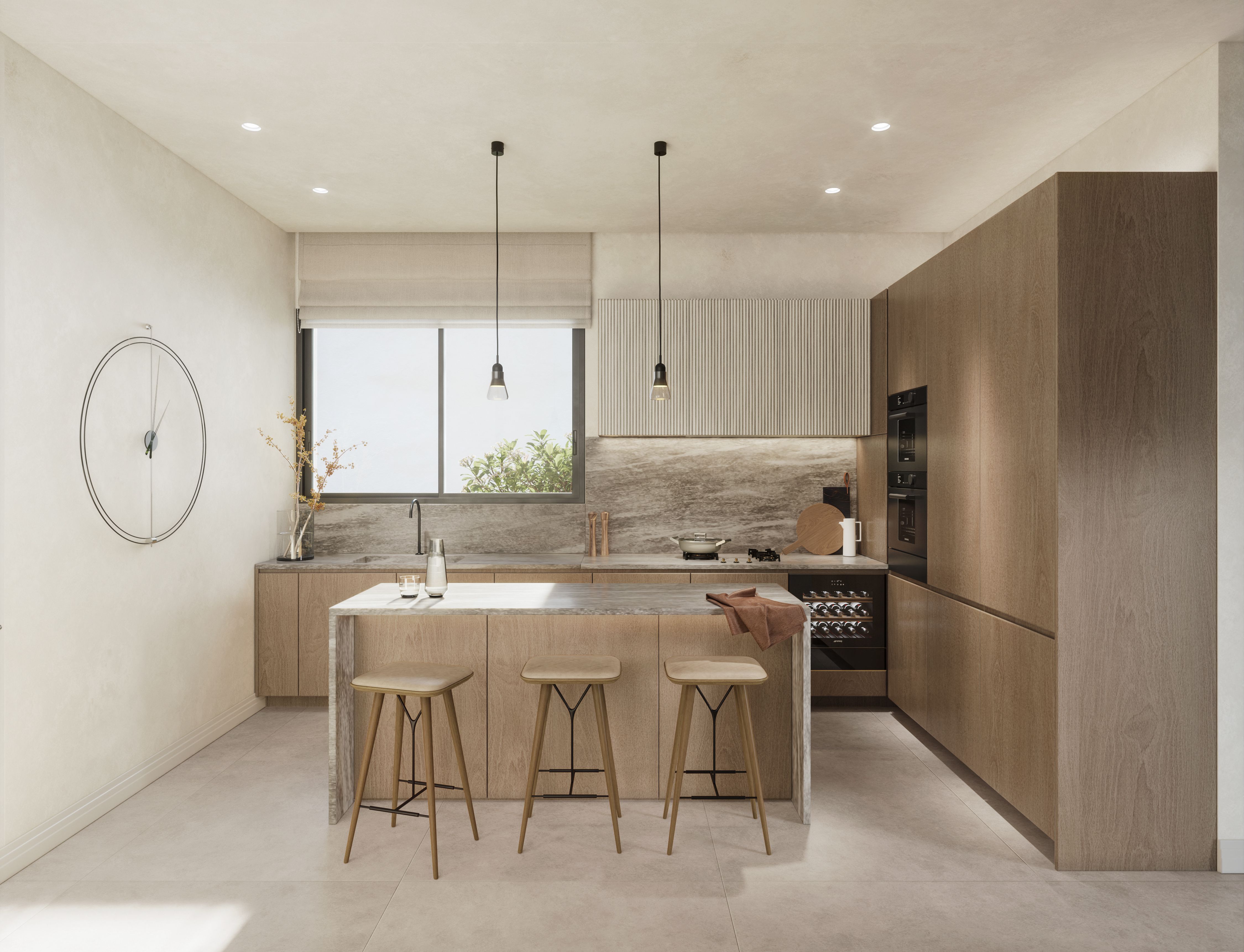 Cocina de diseño contemporáneo en una vivienda de Be Grand El Limonar con isla central y acabados en madera natural
