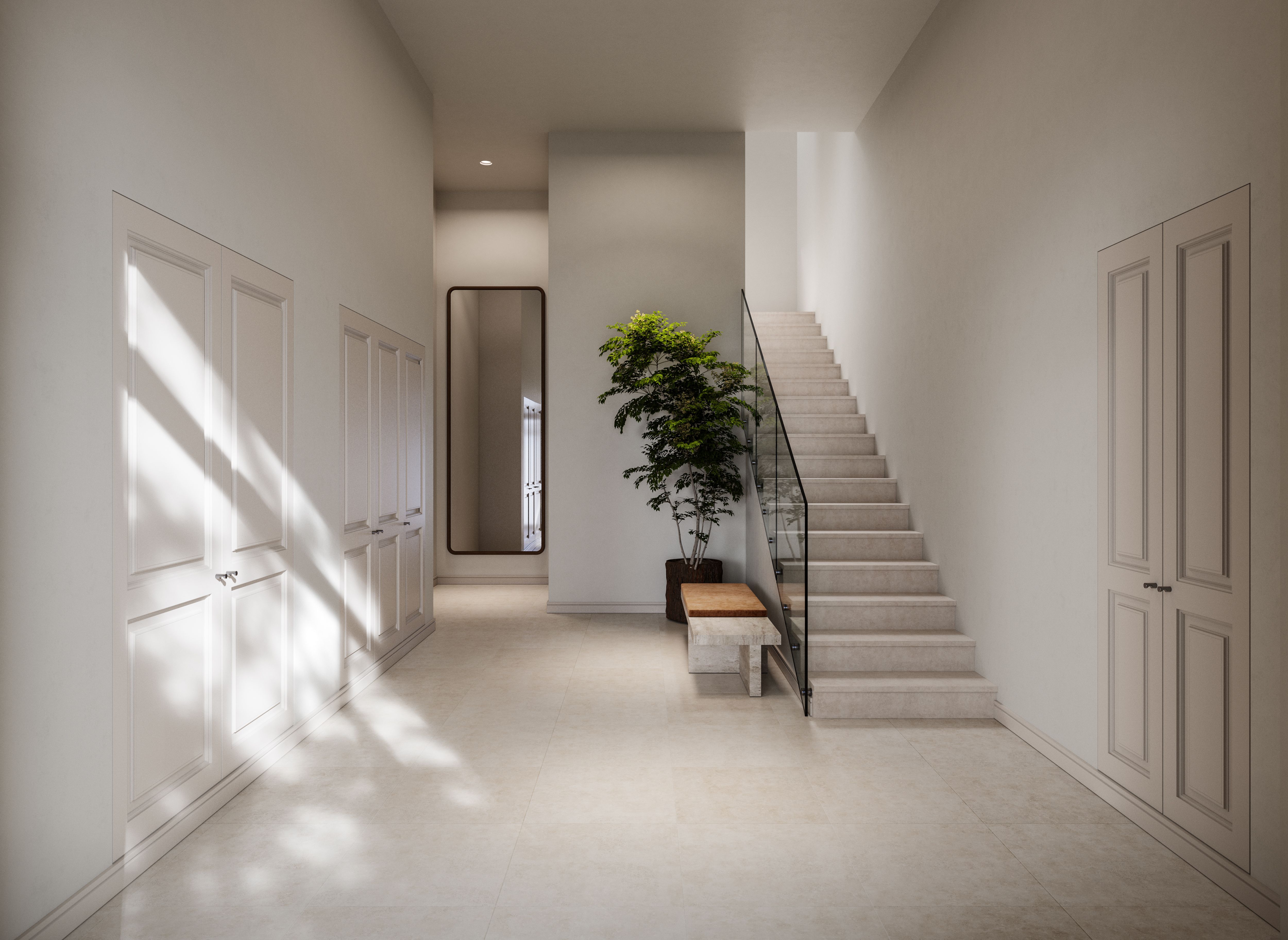 Portal de acceso en una vivienda de Be Grand El Limonar con escalera contemporánea, luz natural y diseño minimalista