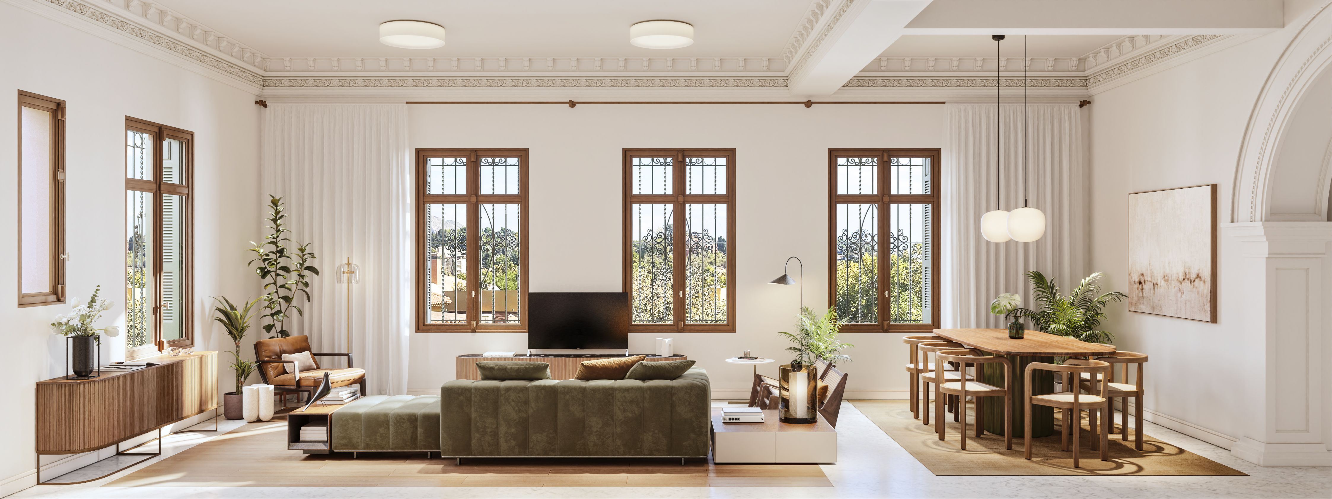 Salón y comedor en un edificio histórico rehabilitado de Be Grand El Limonar con molduras originales y diseño contemporáneo