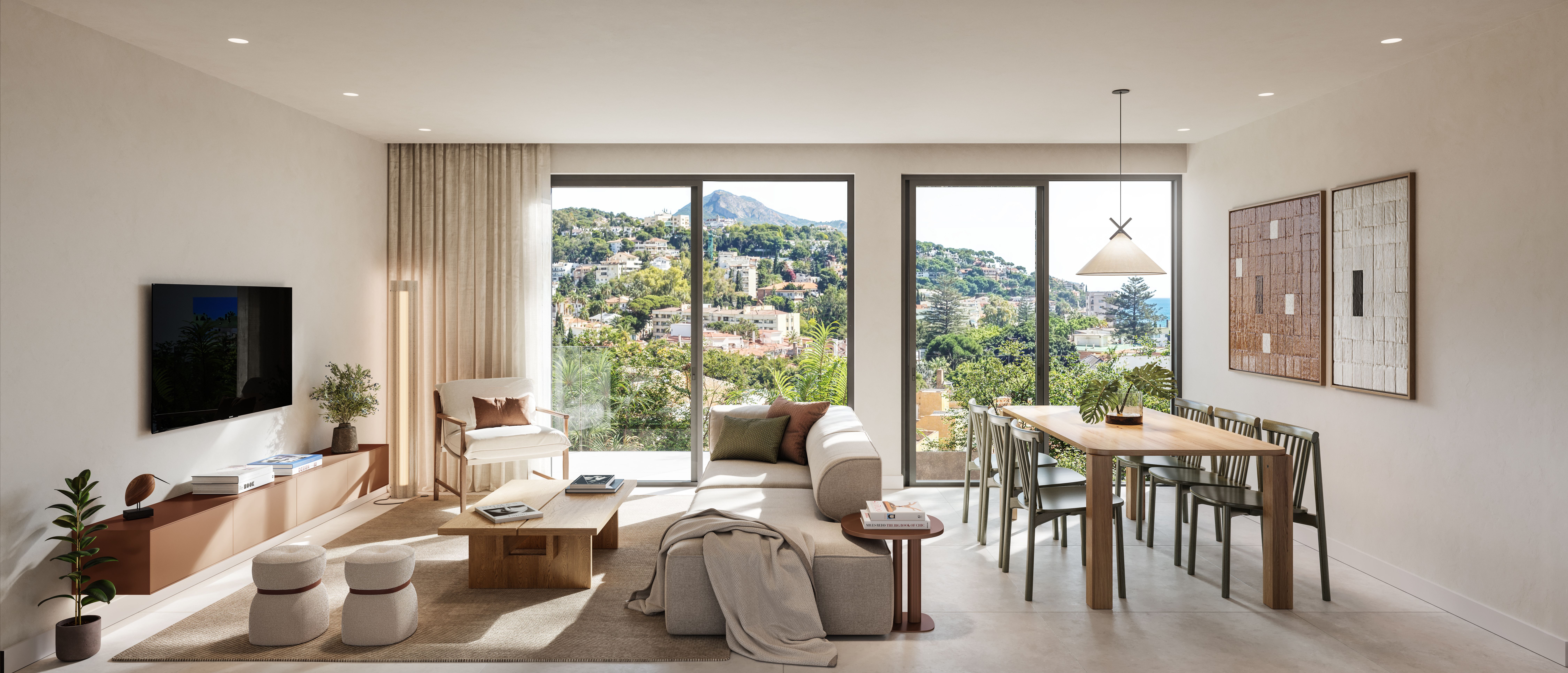 Salón y comedor de una vivienda de Be Grand El Limonar con grandes ventanales y vistas al entorno de El Limonar, Málaga